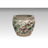 A large 20th century Chinese porcelain fish bowl, polychrome decorated with water lilies and