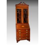 An Edwardian inlaid and satinwood cross banded mahogany bureau bookcase, of small proportions, the