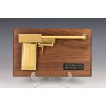 JAMES BOND - The Golden Gun replica film prop, a copy of the famous Golden Gun used by villain