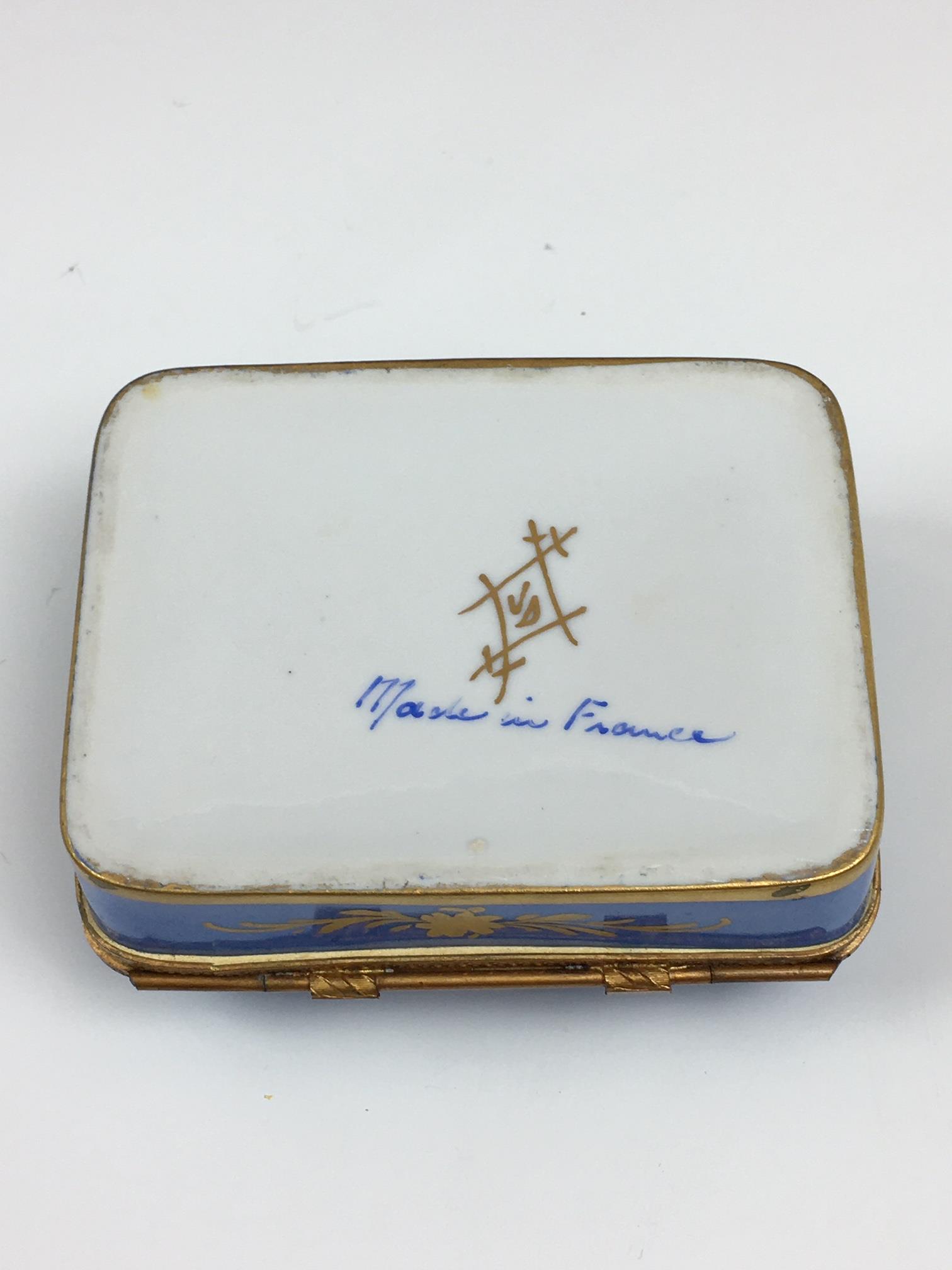 A French porcelain and gilt metal box, 20th century, painted with a floral reserve with gilt - Image 22 of 22