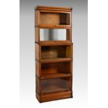 A Globe Wernicke mid-oak sectional lawyer's bookcase, seven part, comprising five glazed bookcase