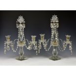 A pair of 19th century style cut glass two light candelabra, mid-20th century, the tall central