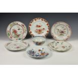 Six late 18th century Chinese porcelain export plates and soup bowls, comprising four with floral