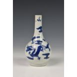 A small Chinese porcelain blue and white bottle vase, probably Kangxi period (1662-1722), painted