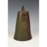 A Qajar bronze bell, Persian, 19th century, of conical form with graduated inner bells, having