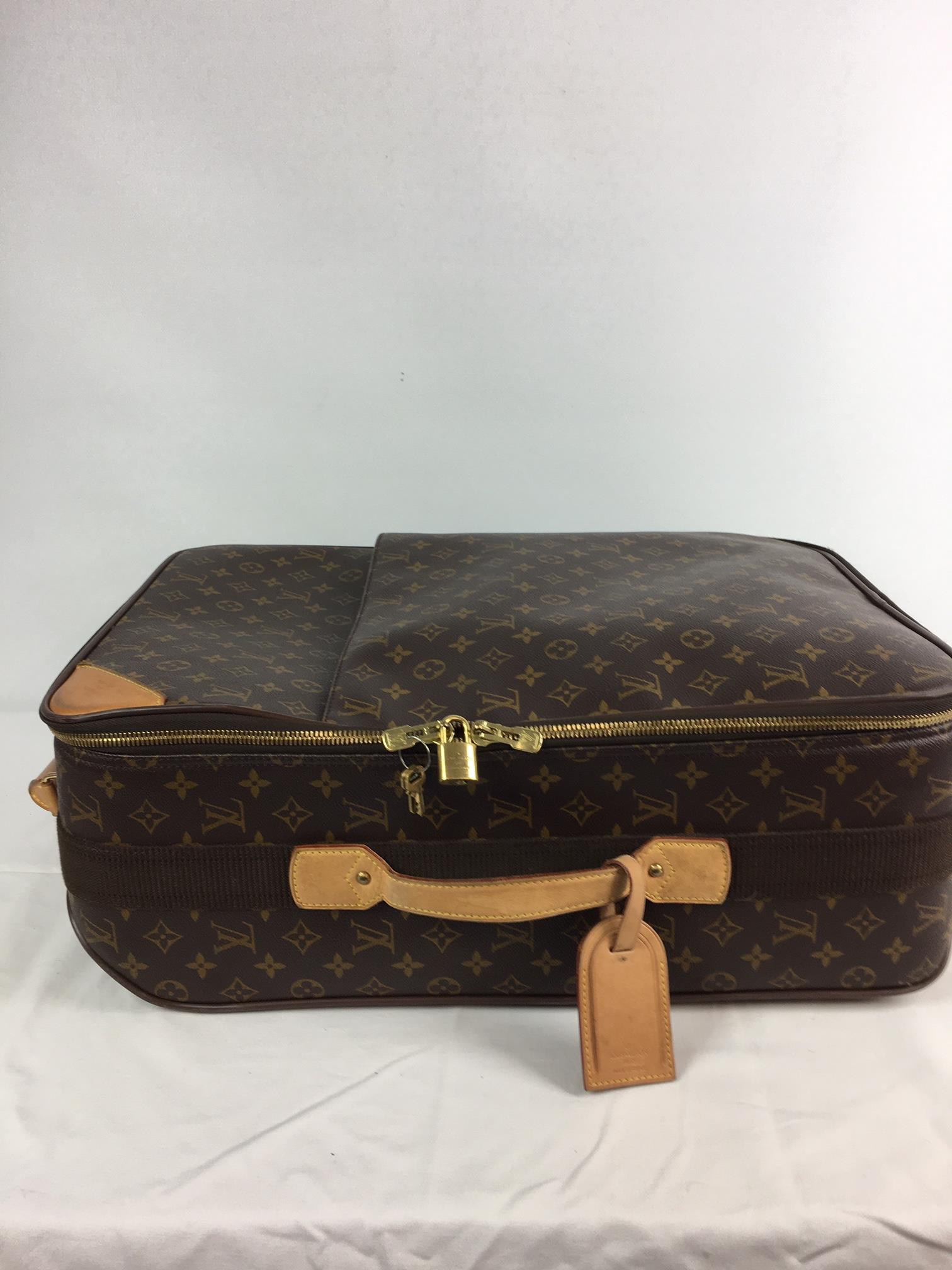 A Louis Vuitton Pegase monogram cabin / trolley bag case, LV catalogue no. M23250, with suit carr