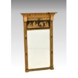 A Regency pier mirror, the inverted breakfront top over a gilt ball and classical figural frieze,