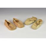 Two pairs of Victorian dolls shoes, comprising of a leather pair with button down side flaps and a