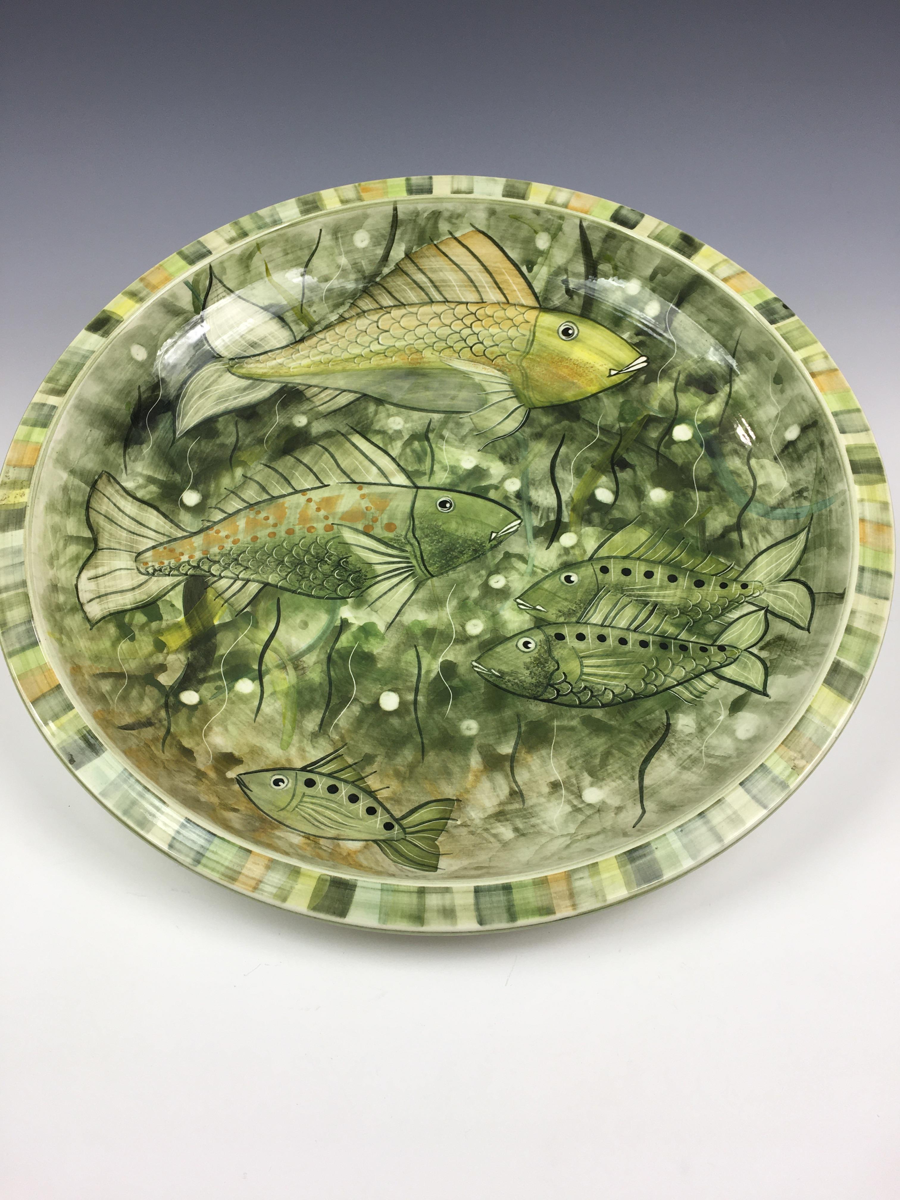 A large Jersey Pottery fish dish, of circular form, the flat rim dish, decorated with fish amidst - Image 2 of 7