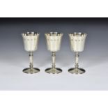A set of six Elizabeth II silver goblets, C. J. Vander Ltd., London 1975, the bell shaped bowls on
