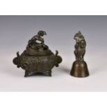 A Chinese bronze covered tripod censer, 18th / 19th century, of squat, globular form, with twin