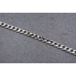 A gentleman's heavy silver chain bracelet, 11½in. (29.3cm.) long, weight 2.2 tr.oz.