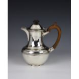 A George V silver hot water jug, William Comyns & Sons Ltd, London, 1928, of ogee baluster form,