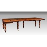 A mid-Victorian mahogany extending dining table with concertina mechanism, the fold over D-shaped