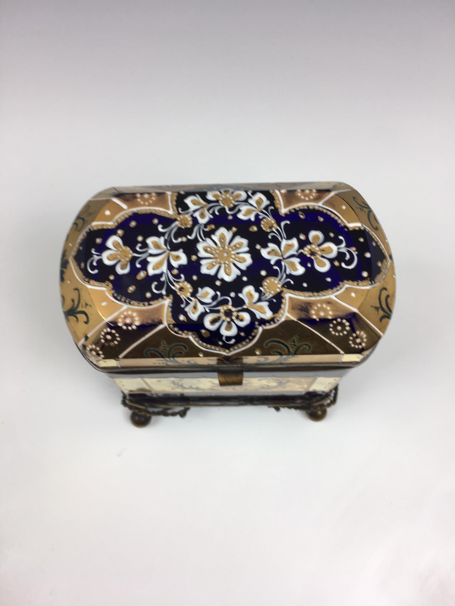 A French porcelain and gilt metal box, 20th century, painted with a floral reserve with gilt - Image 5 of 22