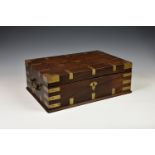An Anglo Indian rosewood and brass bound stationary box, c.1900, the hinged lid opening to reveal