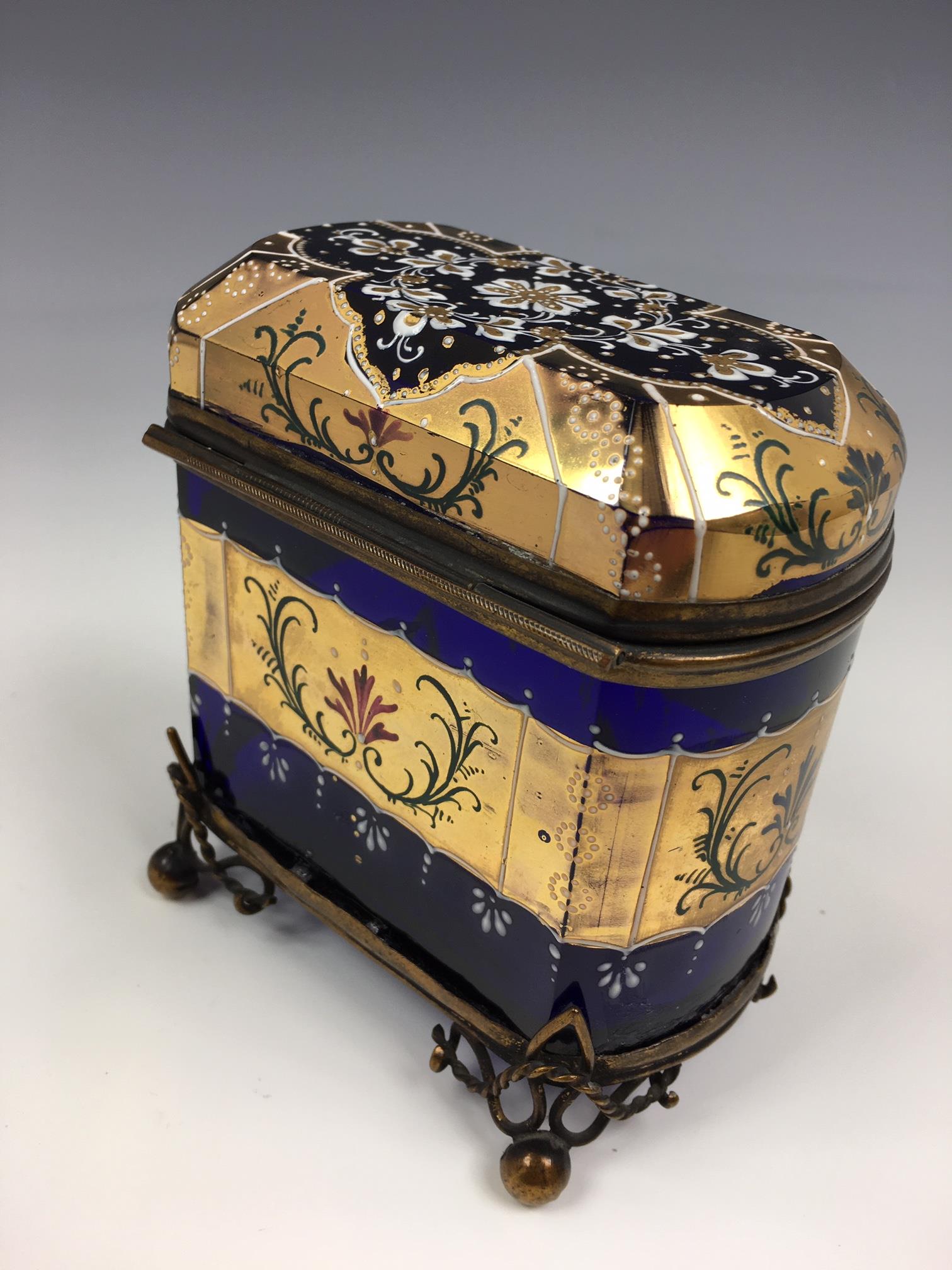 A French porcelain and gilt metal box, 20th century, painted with a floral reserve with gilt - Image 4 of 22