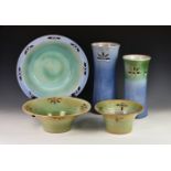 A collection of Guernsey pottery by Godfrey, all decorated in shades of blues and greens, each