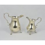 An Edward VIII silver cream jug, in George II pear shaped form, A & W, London, 1936, having scroll