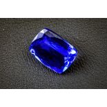 A 3.42ct cushion mixed cut tanzanite, accompanied by a certificate from the Canadian Gemological &