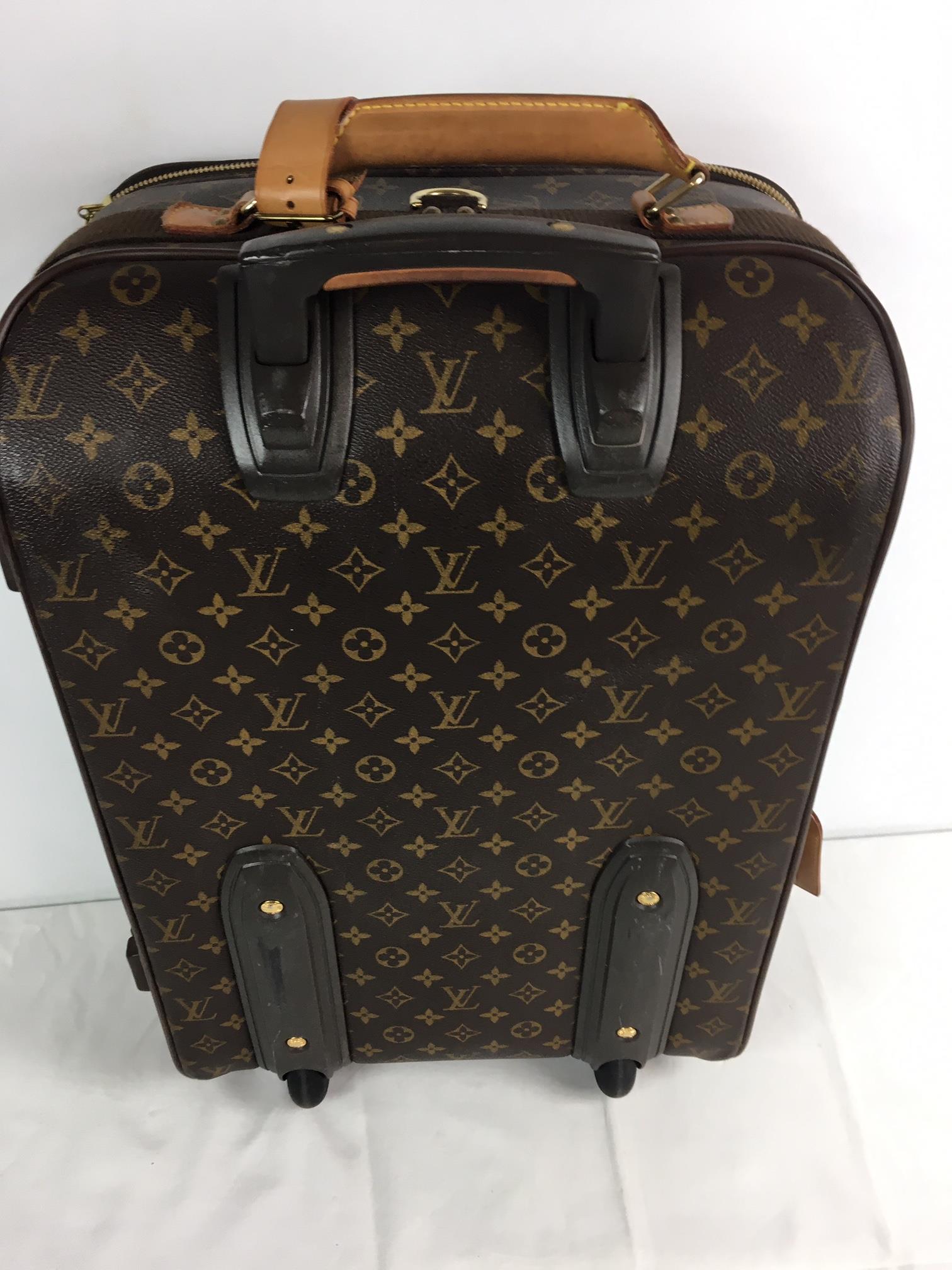 A Louis Vuitton Pegase monogram cabin / trolley bag case, LV catalogue no. M23250, with suit carr