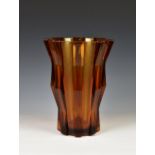 A mid century Czechoslovakian amber glass brutalist form vase, of tapering flared form, with