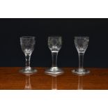 Three 18th century engraved small wine glasses - one possibly Jacobite, the first c.1750, the