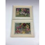 A pair of Limoges porcelain floral decorated plaques, signed, 4 5/8 x 6in. (11.8 x 16.5cm.), both