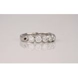 A five stone platinum and diamond ring, with five brilliant cut diamonds in a rubover scroll