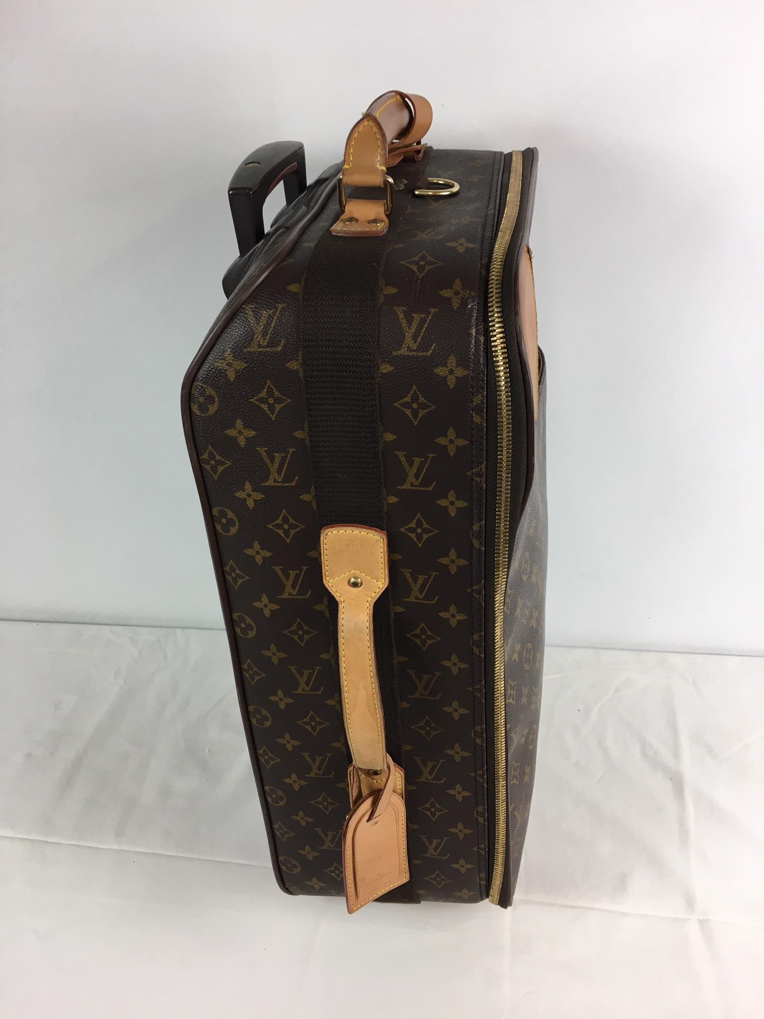 A Louis Vuitton Pegase monogram cabin / trolley bag case, LV catalogue no. M23250, with suit carr