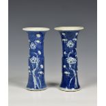 A pair of Chinese blue and white porcelain Kangxi style Gu vases, probably late 19th early 20th