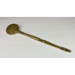 A very rare 18th century English or Dutch hand forged brass salamander, the turned handle with acorn