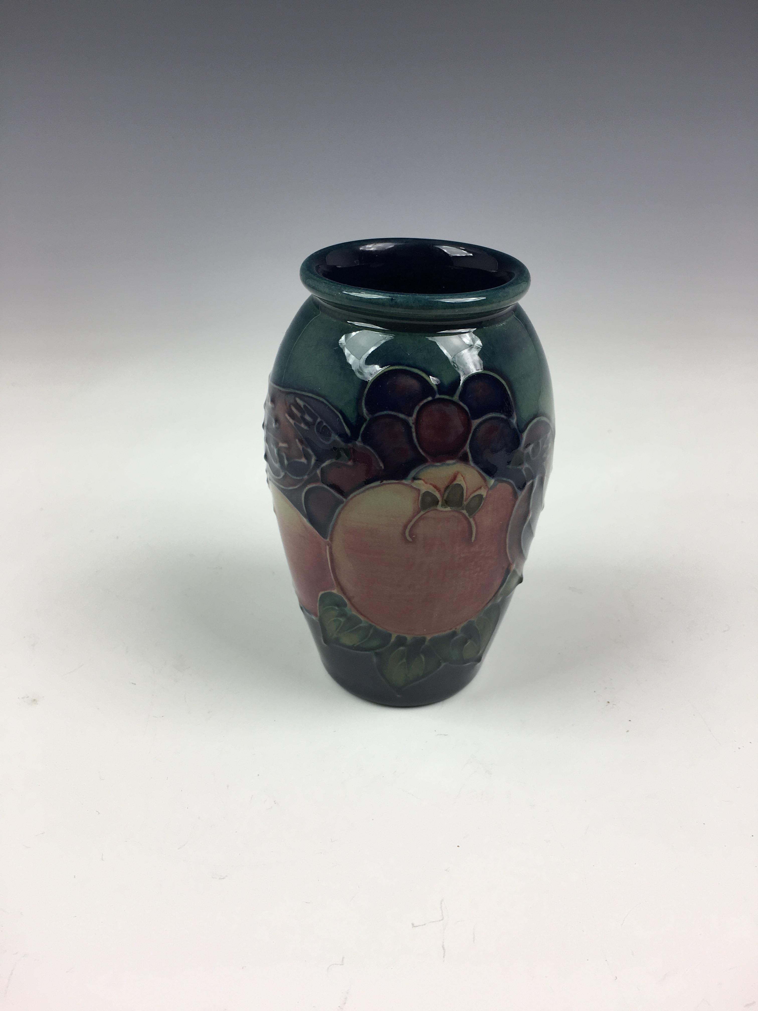 A modern Moorcroft 'Birds and Fruit' vase, the small ovoid vase decorated with birds and fruit on - Image 3 of 7