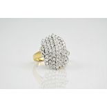 An 18ct and yellow and white gold dress ring inset with approximate 2ct brilliant cut diamonds.,