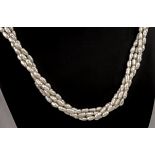 A freshwater rice pearl necklace with 9ct gold clasp, consisting of 4 strands of pearls, each