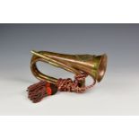 A copper and brass Argyle and Sutherland bugle and tassel, lacks mouthpiece.
