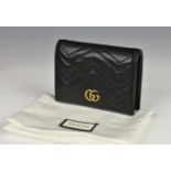 A Gucci GG Marmont small quilted leather wallet