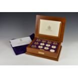 A Royal Mint Queen Elizabeth II Golden Jubilee silver proof coin collection, the 24 silver gilt