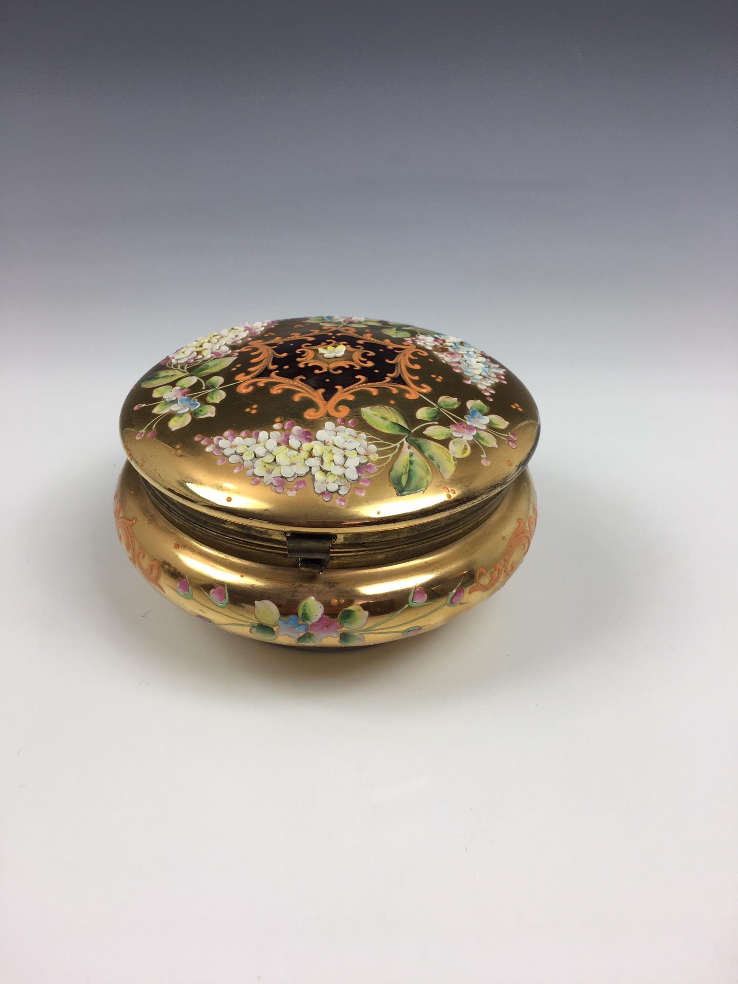 A French porcelain and gilt metal box, 20th century, painted with a floral reserve with gilt - Image 8 of 22