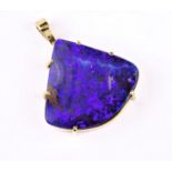 An 18ct yellow gold and black opal pendant, hallmarked London 2004, with a 24 x 22mm. fan shaped