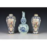 A pair of English enamelled creamware chinoiserie vases, late 18th / early 19th century, possibly