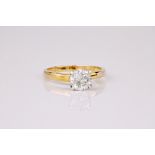 A diamond solitaire ring, the round cut diamond weighing approximately 1ct and set in a 9ct yellow