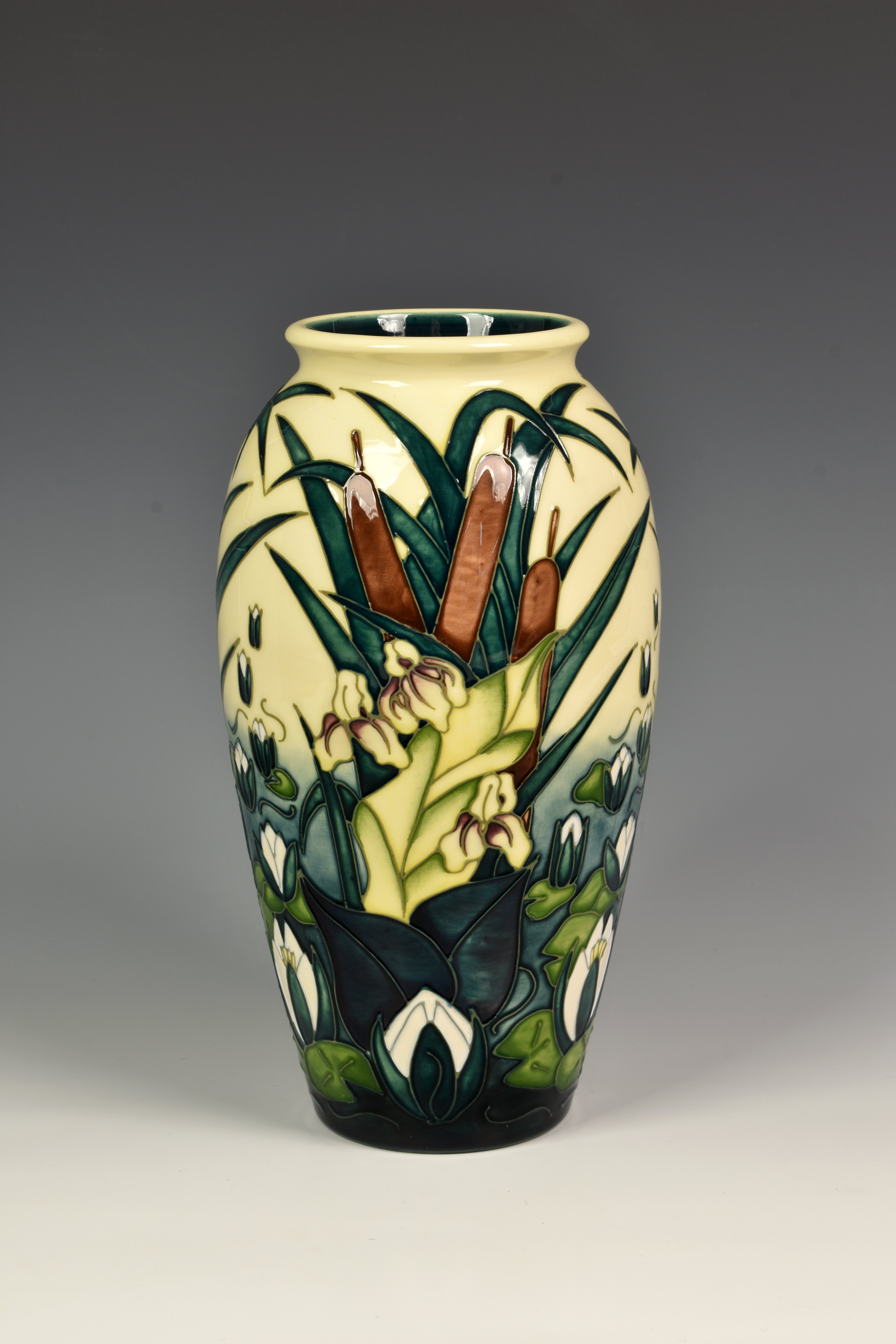 A Moorcroft Pottery 'Lamia' pattern vase, of slender ovoid form, tubeline decorated in the Lamia