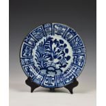 A Chinese export blue and white plate, probably Kangxi period, the plate with central circular