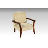 A vintage mid-century walnut child's chair, the serpentine back over a square stuffover seat and