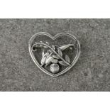 A Georg Jensen silver brooch designed by Arno Malinowski, model No. 312, c.1945, love heart, pierced