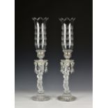A pair of Baccarat 'Enfant' glass storm or hurricane lamps, late 20th century, the tall tulip form