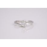 An 18ct white gold single stone diamond ring., The brilliant cut diamond weighing 0.34ct, ring
