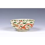 A Chinese porcelain famille verte dragon bowl, probably early 20th century, painted to the