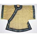 A Chinese ladies informal silk robe, Qing Dynasty, mid-19th century, the pale gold satin decorated